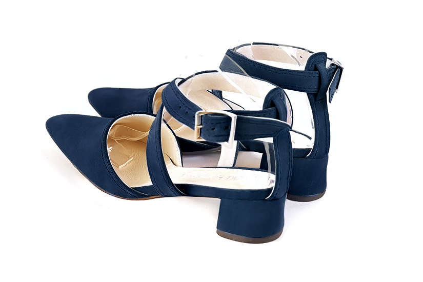 Navy blue women's open back shoes, with crossed straps. Tapered toe. Low flare heels. Rear view - Florence KOOIJMAN